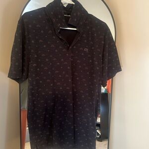 Travis Mathew Black Polo Shirt with Subtle Pattern